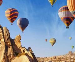 Enjoy a hot air balloon ride to see Cappadocia's splendor from above