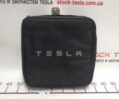 The original TESLA charger bag has the article 1126118-00-B