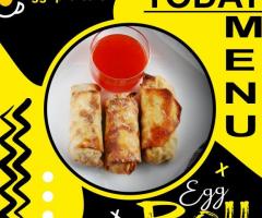 Happiness is eggs on egg roll - Eggxpro Cafe