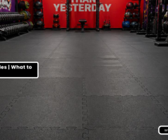 Interlocking floor tiles