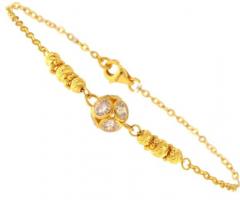 "Glamour in Gold: 22-Carat Statement Bracelet"