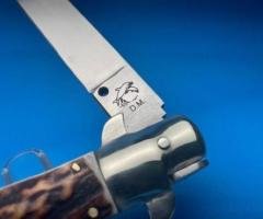 Showcasing the Exquisite Dolphin Stag Mariano Switchblade